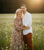 Campo de flores al atardecer - Revive